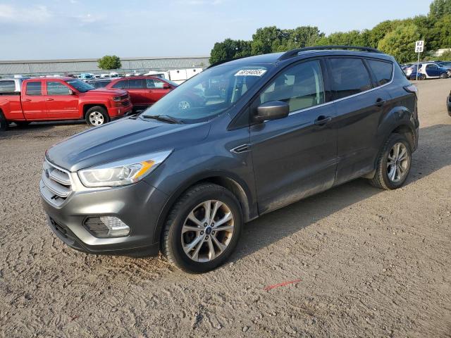 FORD ESCAPE SE 2017 with VIN 1FMCU9GD1HUC94071 - Photo from auction
