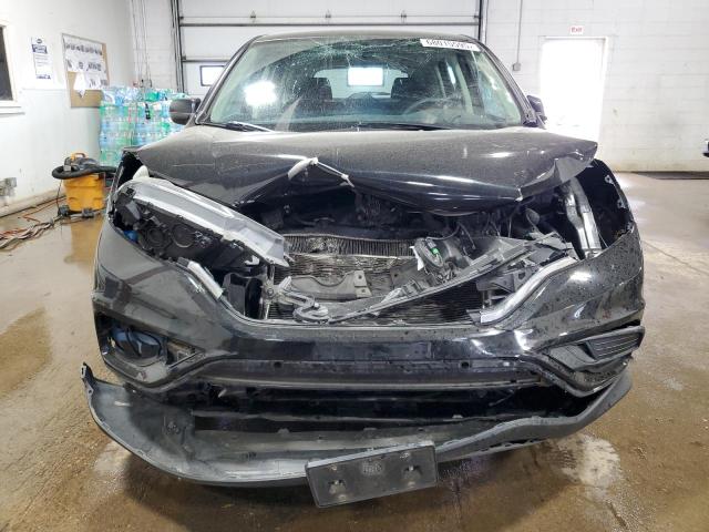 Photo 5 from auction – 2015 HONDA CR-V LX with VIN 2HKRM4H38FH629034