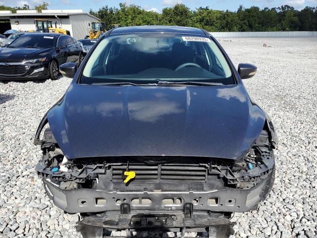 Photo 5 from auction – 2016 FORD FOCUS SE with VIN 1FADP3F20GL250053