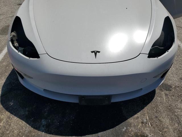 Photo 11 from auction – 2021 TESLA MODEL 3 with VIN 5YJ3E1EC8MF990586