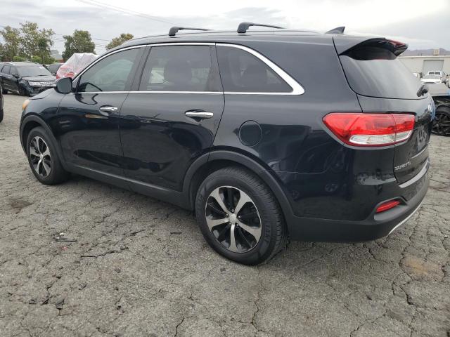 Photo 2 from auction – 2016 KIA SORENTO EX with VIN 5XYPH4A55GG093594