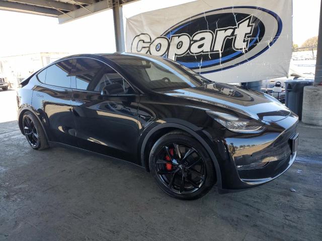 Photo 4 from auction – 2021 TESLA MODEL Y with VIN 5YJYGDEF0MF089143