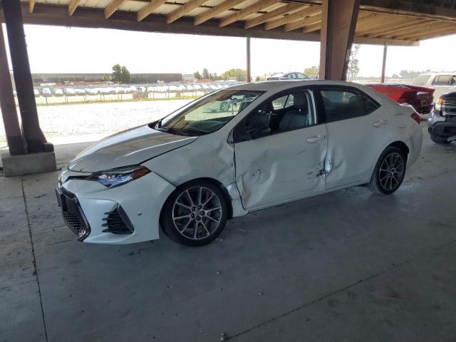 TOYOTA COROLLA L 2017 with VIN 5YFBURHE4HP624306 - Photo from auction