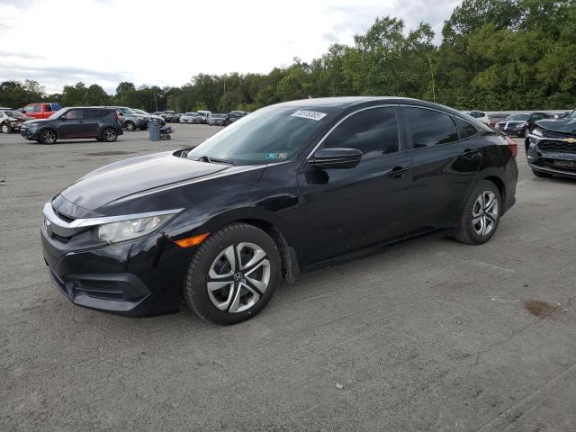 HONDA CIVIC LX 2018 with VIN 19XFC2E56JE021879 - Photo from auction