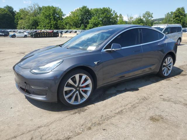 TESLA MODEL 3 2018 with VIN 5YJ3E1EB9JF105962 - Photo from auction