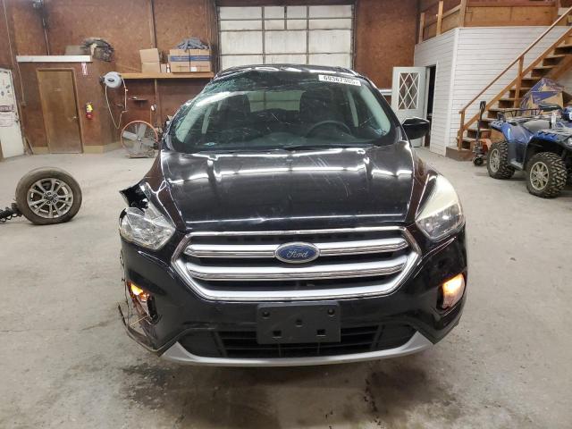 Photo 5 from auction – 2017 FORD ESCAPE SE with VIN 1FMCU9GD6HUE62044