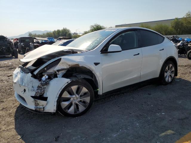 TESLA MODEL Y 2024 with VIN 7SAYGDED1RF091587 - Photo from auction