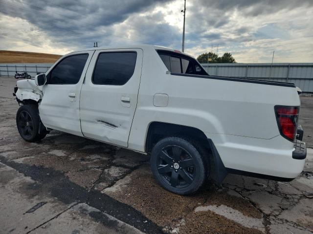 Photo 2 from auction – 2014 HONDA RIDGELINE with VIN 5FPYK1F63EB014067