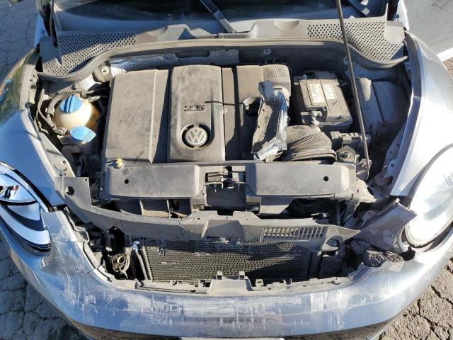 Photo 11 from auction – 2014 VOLKSWAGEN BEETLE with VIN 3VWFP7AT7EM624726