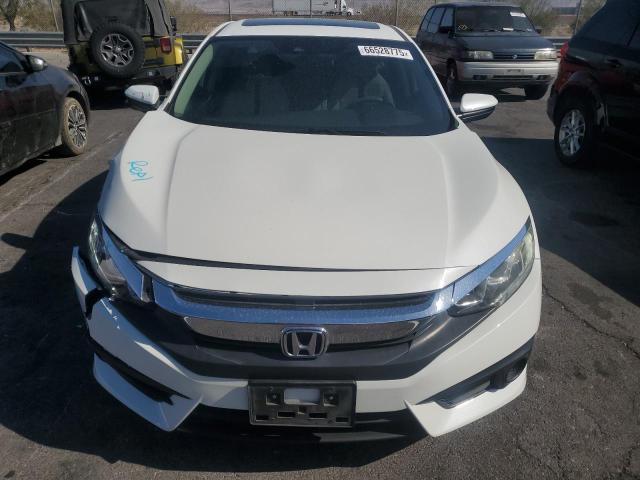 Photo 5 from auction – 2018 HONDA CIVIC EX with VIN 2HGFC2F87JH576418