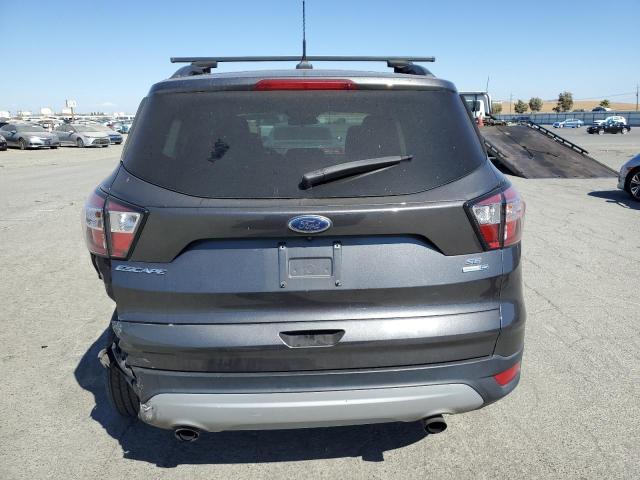 Photo 6 from auction – 2018 FORD ESCAPE SE with VIN 1FMCU9GD9JUC24789