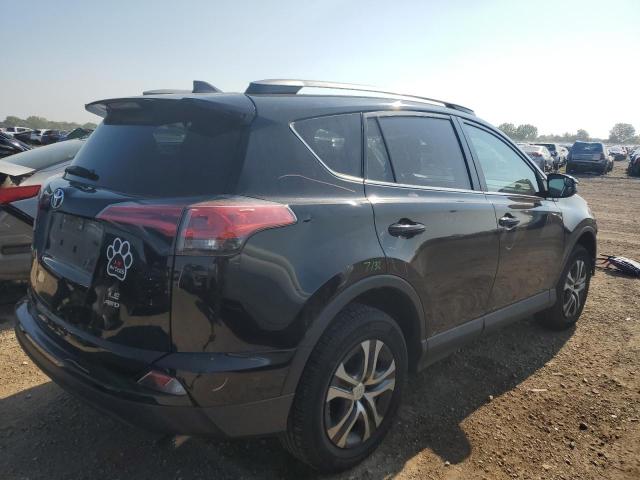 Photo 3 from auction – 2018 TOYOTA RAV4 LE with VIN 2T3BFREV7JW796386