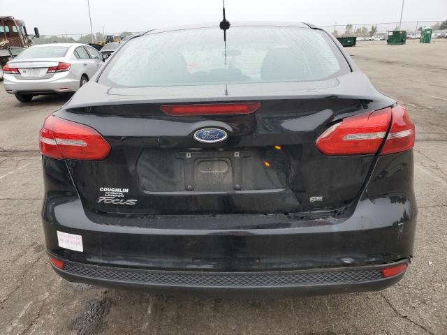 Photo 6 from auction – 2016 FORD FOCUS SE with VIN 1FADP3F28GL348974