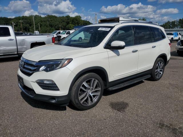 HONDA PILOT ELIT 2017 with VIN 5FNYF6H02HB068757 - Photo from auction