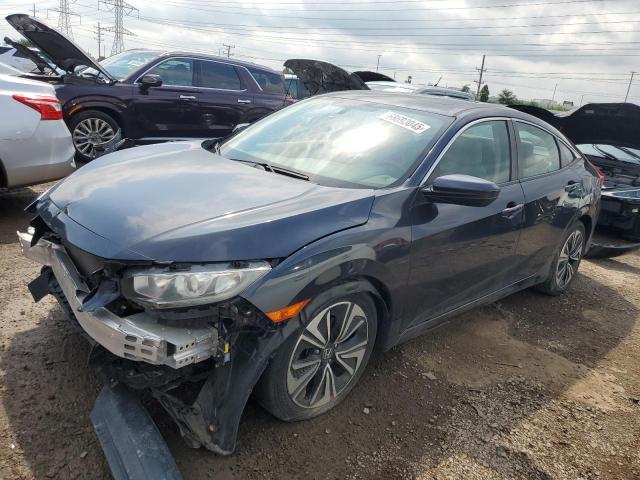 HONDA CIVIC EX 2016 with VIN 19XFC1F3XGE001330 - Photo from auction