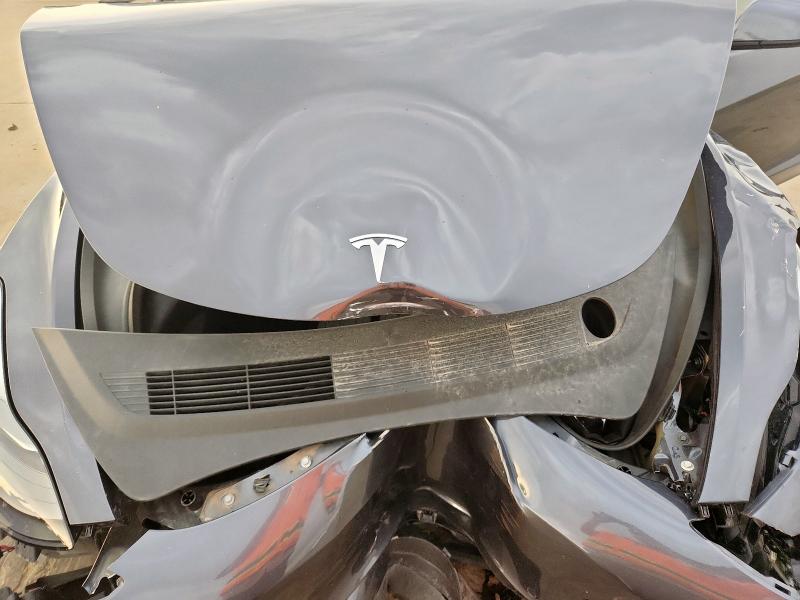 Photo 11 from auction – 2022 TESLA MODEL 3 with VIN 5YJ3E1EAXNF102775