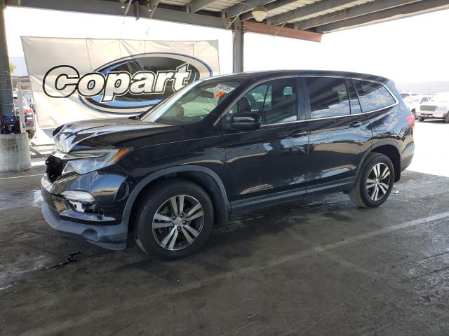 HONDA PILOT EXL 2016 with VIN 5FNYF6H82GB085756 - Photo from auction