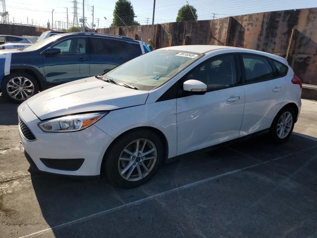 FORD FOCUS SE 2017 with VIN 1FADP3K21HL271792 - Photo from auction