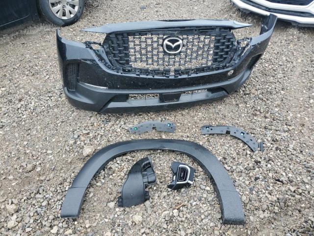 Photo 13 from auction – 2025 MAZDA CX-50 PREF with VIN 7MMVAABW7SN117476
