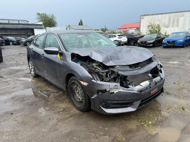 HONDA CIVIC LX 2018 with VIN 2HGFC2E52JH044615 - Photo from auction