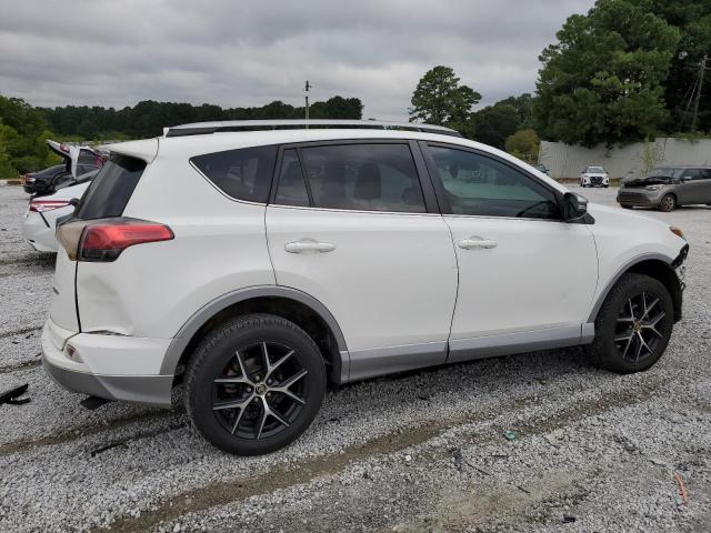 Photo 3 from auction – 2018 TOYOTA RAV4 SE with VIN 2T3NFREV3JW450669