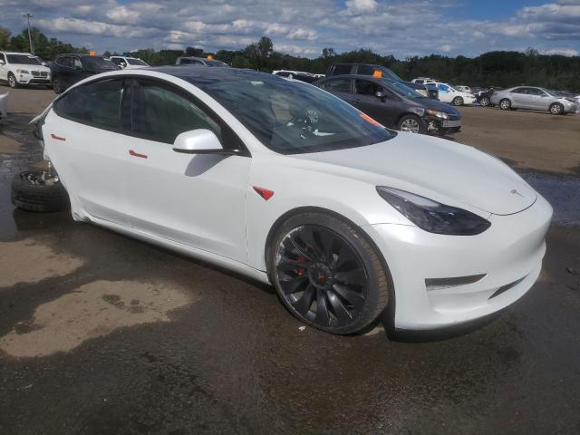 Photo 4 from auction – 2022 TESLA MODEL 3 with VIN 5YJ3E1EC4NF253709