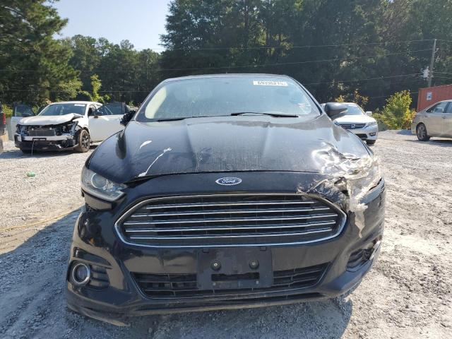Photo 5 from auction – 2016 FORD FUSION TITANIUM with VIN 3FA6P0D96GR265357