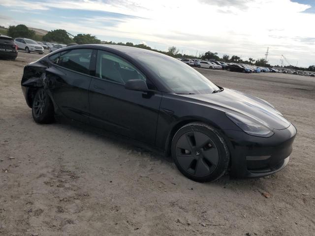 Photo 4 from auction – 2021 TESLA MODEL 3 with VIN 5YJ3E1EA9MF991390