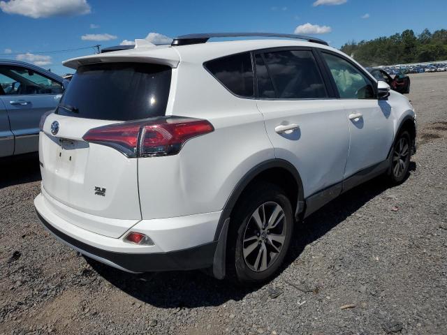 Photo 3 from auction – 2017 TOYOTA RAV4 XLE with VIN JTMRFREV2HJ115218