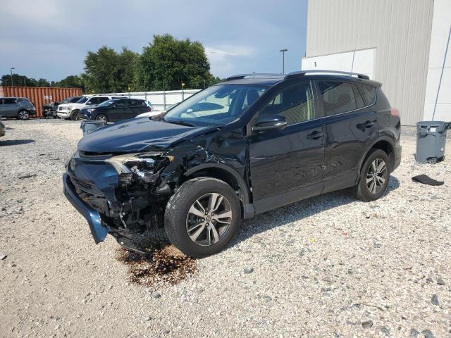 Photo 1 from auction – 2017 TOYOTA RAV4 XLE with VIN JTMWFREV4HD093644