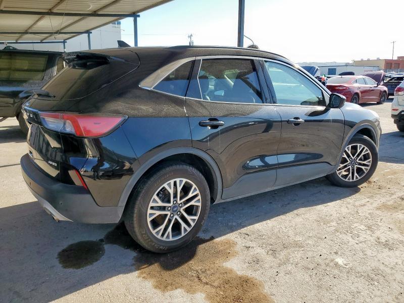 Photo 3 from auction – 2021 FORD ESCAPE SEL with VIN 1FMCU9H64MUA60923