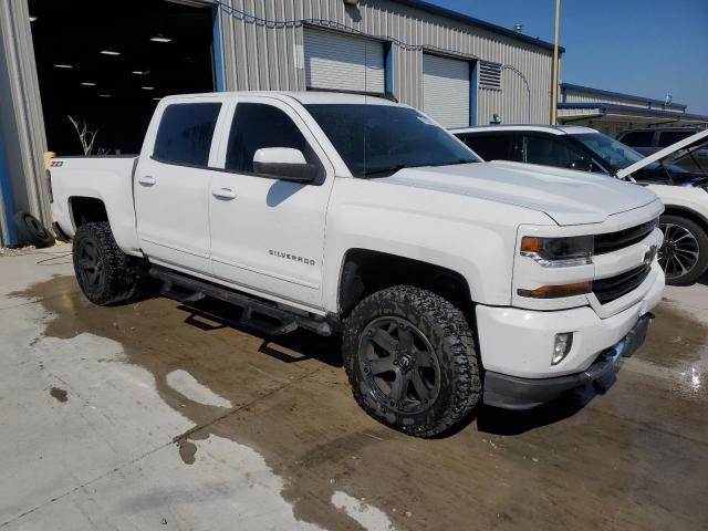 Photo 4 from auction – 2018 CHEVROLET SILVERADO with VIN 3GCUKREC4JG555579