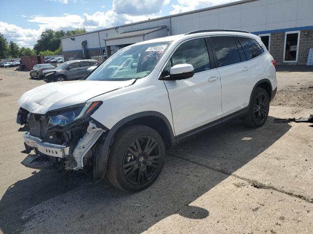 HONDA PILOT SE 2022 with VIN 5FNYF6H23NB090148 - Photo from auction