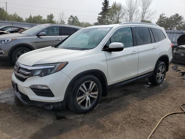 HONDA PILOT EXLN 2018 with VIN 5FNYF6H76JB501600 - Photo from auction