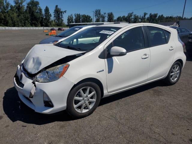 TOYOTA PRIUS C 2012 with VIN JTDKDTB33C1521427 - Photo from auction