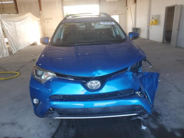 Photo 5 from auction – 2017 TOYOTA RAV4 XLE with VIN JTMWFREV5HJ710647