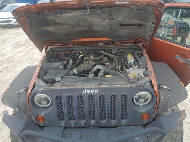 Photo 11 from auction – 2011 JEEP WRANGLER U with VIN 1J4BA5H14BL558199