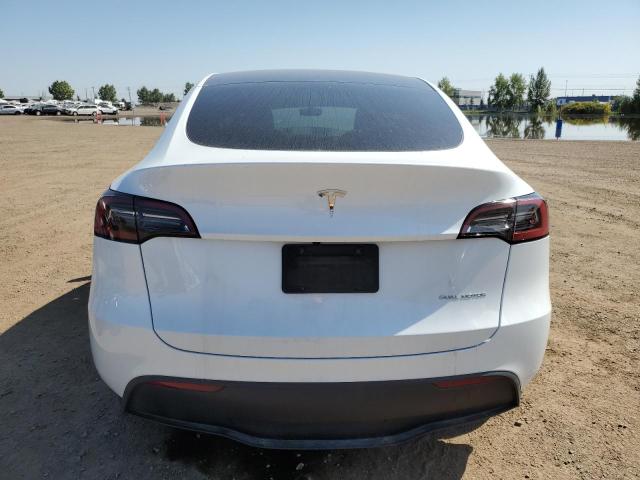 Photo 6 from auction – 2023 TESLA MODEL Y with VIN LRWYGDEEXPC104060