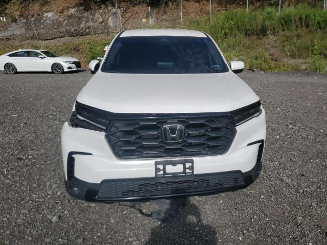 Photo 5 from auction – 2023 HONDA PILOT EXL with VIN 5FNYG2H47PB010540