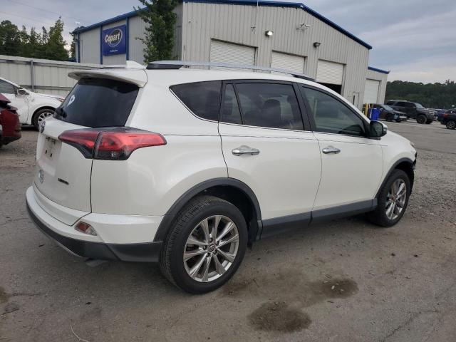 Photo 3 from auction – 2018 TOYOTA RAV4 LIMIT with VIN JTMYFREV1JD116182