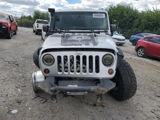 Photo 5 from auction – 2010 JEEP WRANGLER U with VIN 1J4BA5H15AL123254