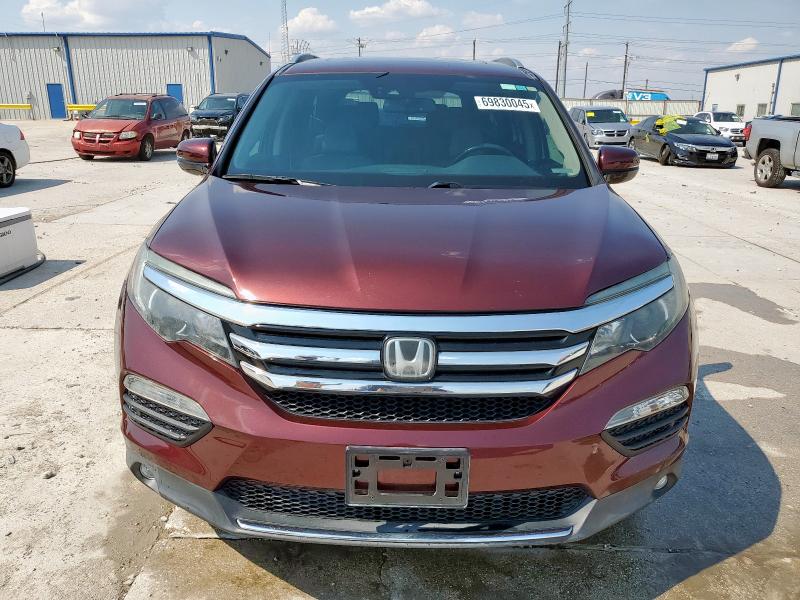 Photo 5 from auction – 2018 HONDA PILOT ELIT with VIN 5FNYF6H04JB068202