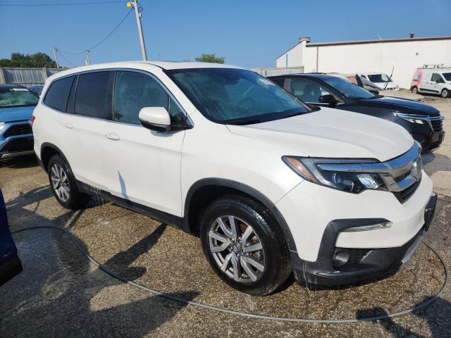Photo 4 from auction – 2021 HONDA PILOT EXL with VIN 5FNYF6H53MB003759