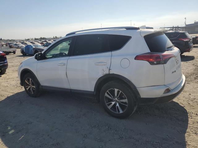 Photo 2 from auction – 2016 TOYOTA RAV4 XLE with VIN 2T3WFREV7GW286372