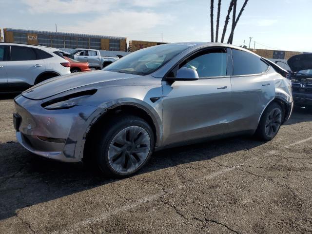 TESLA MODEL Y 2025 with VIN 7SAYGDED7SF259884 - Photo from auction