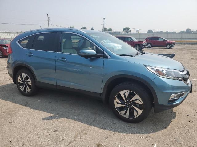 Photo 4 from auction – 2016 HONDA CR-V TOURING with VIN 5J6RM4H97GL013689