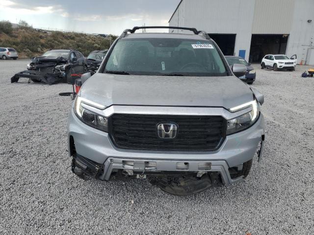 Photo 5 from auction – 2023 HONDA RIDGELINE with VIN 5FPYK3F75PB012537