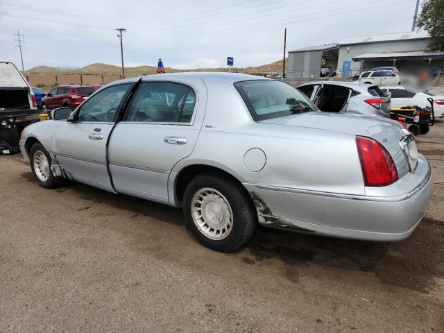 Photo 2 from auction – 2001 LINCOLN TOWN CAR E with VIN 1LNHM81W91Y717729