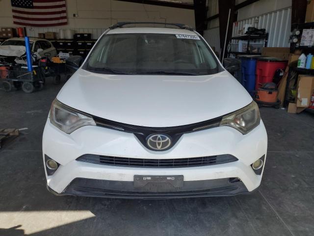 Photo 5 from auction – 2018 TOYOTA RAV4 LE with VIN JTMBFREV6JJ180953