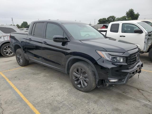 Photo 4 from auction – 2023 HONDA RIDGELINE with VIN 5FPYK3F11PB043473